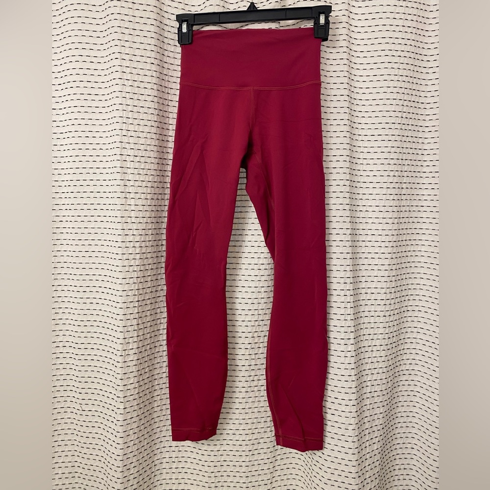 Lululemon pomegranate colored legging, size 4!